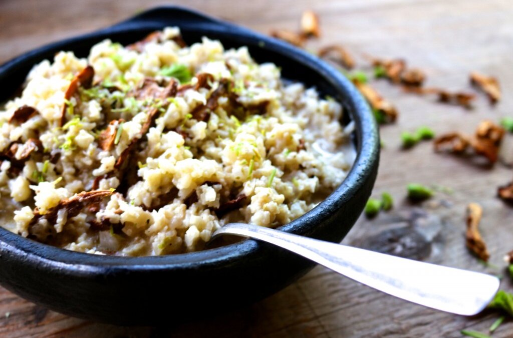 Forest Risotto with Cauliflower Rice, Chanterelles,Spruce Tips & Goat Cheese